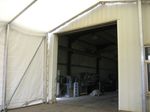 Lagerzelt Industriezelt vor einer Halle angesetzt
